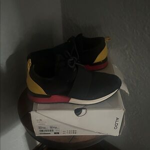 ALDO Black Slip-On Sneakers with Yellow Heel and Red Midsole